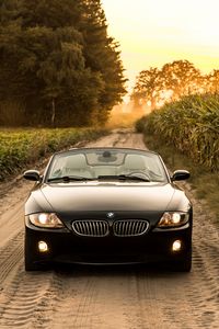 Превью обои bmw, машина, вид спереди, фара, дорога