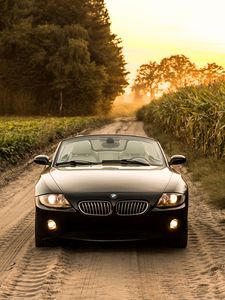 Превью обои bmw, машина, вид спереди, фара, дорога