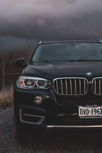 Превью обои bmw, вид спереди, фары, черный