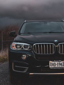 Превью обои bmw, вид спереди, фары, черный
