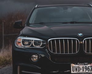 Превью обои bmw, вид спереди, фары, черный