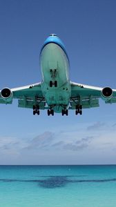 Превью обои boeing 747, тень, океан, полет