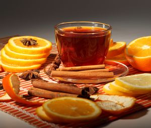 Превью обои чашка, чай, стекло, апельсины, корица, кожура, ваниль