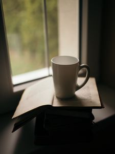 Превью обои чашка, книга, чтение, окно