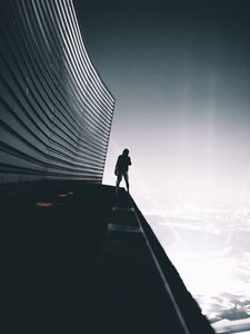 Превью обои человек, крыша, высота, небо