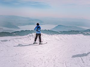 Превью обои человек, лыжи, горы, снег, зима, белый
