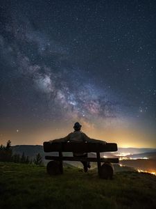 Превью обои человек, скамейка, звездное небо