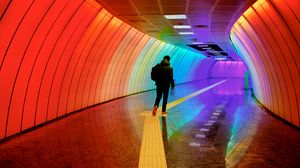 Превью обои человек, тоннель, подсветка, разноцветный, радуга