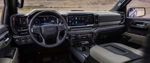 Превью обои chevrolet, автомобиль, руль, салон, горы, вид