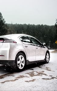 Превью обои chevrolet volt, chevrolet, снегопад, вид сбоку, снег