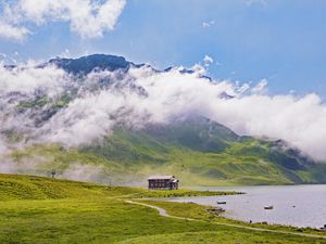 Превью обои дом, берег, горы, облака, природа