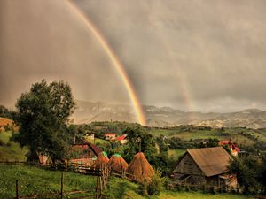 Превью обои дома, тучи, радуга, пейзаж