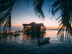 Превью обои домик, море, закат, ветка, вода