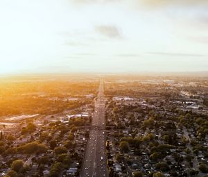 Превью обои дорога, автомобили, дома, деревья, вид сверху