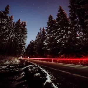Превью обои дорога, деревья, ночь, снег, длинная выдержка