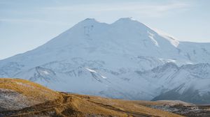 Превью обои дорога, горы, холмы, снег, заснеженный