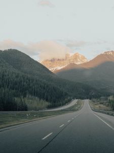 Превью обои дорога, горы, разметка, деревья, облака
