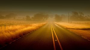 Превью обои дорога, линии, туман, полосы, неизвестность, асфальт, поля, трава, осень