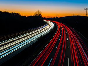 Превью обои дорога, поворот, подсветка, движение, вечер, сумерки, длинная выдержка