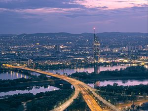 Превью обои дорога, река, здания, огни, город, сумерки