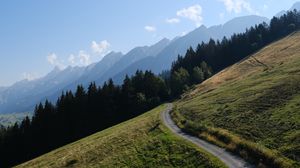 Превью обои дорога, склон, деревья, горы, пейзаж, природа
