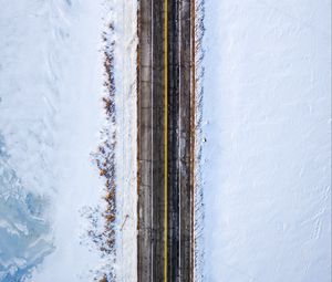 Превью обои дорога, вид сверху, снег, разметка