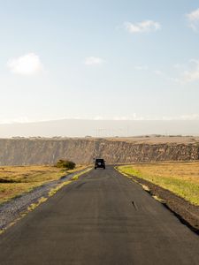 Превью обои дорога, внедорожник, поле, холм