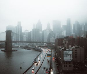 Превью обои дорога, здания, вид сверху, город, туман