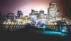 Превью обои дым, город, человек, ночь, здания, мост