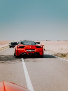 Превью обои ferrari 458, ferrari, красный, спорткар, вид сзади, дорога, движение