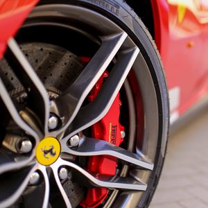 Превью обои ferrari, шина, колесо, логотип