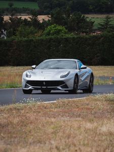 Превью обои ferrari, спорткар, автомобиль, вид спереди, дорога