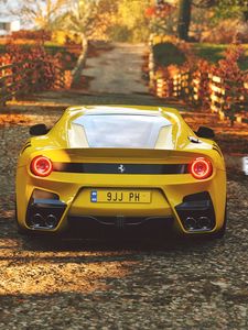 Превью обои ferrari, спорткар, желтый, вид сзади