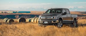 Превью обои ford, автомобиль, черный, внедорожник, трава