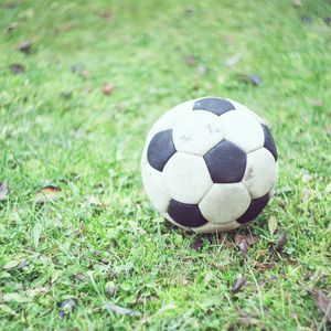 Превью обои футбольный мяч, футбол, трава, размытость