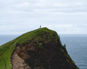 Превью обои гора, море, силуэт, холм, пейзаж