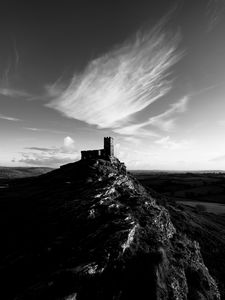 Превью обои гора, здание, башня, небо, черно-белый