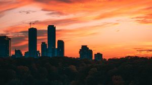 Превью обои город, башня, закат, дорога, деревья