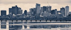 Превью обои город, здания, мост, река, отражение, черно-белый