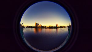 Превью обои город, здания, вода, иллюминатор, вид