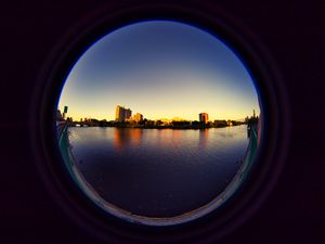 Превью обои город, здания, вода, иллюминатор, вид