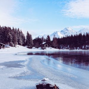 Превью обои горы, лед, снег, зима, домик, деревья