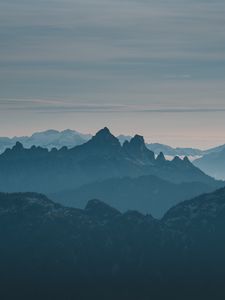 Превью обои горы, скалы, вершины, даль, туман