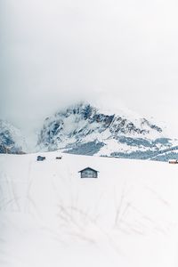 Превью обои горы, снег, домики, зима, пейзаж