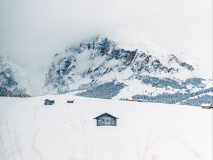 Превью обои горы, снег, домики, зима, пейзаж