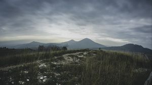 Превью обои горы, трава, тропинка, даль