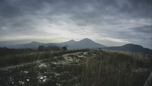 Превью обои горы, трава, тропинка, даль