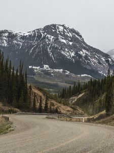 Превью обои горы, вершины, дорога, лес, заснеженный