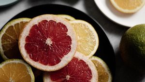 Превью обои грейпфрут, апельсин, лимон, фрукты, дольки