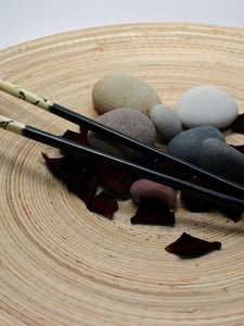 Превью обои япония, палочки, лепестки, камни, гармония